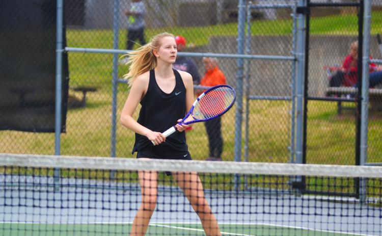 Ava Carnes awaits the return in her match against Stephens County on March 15.