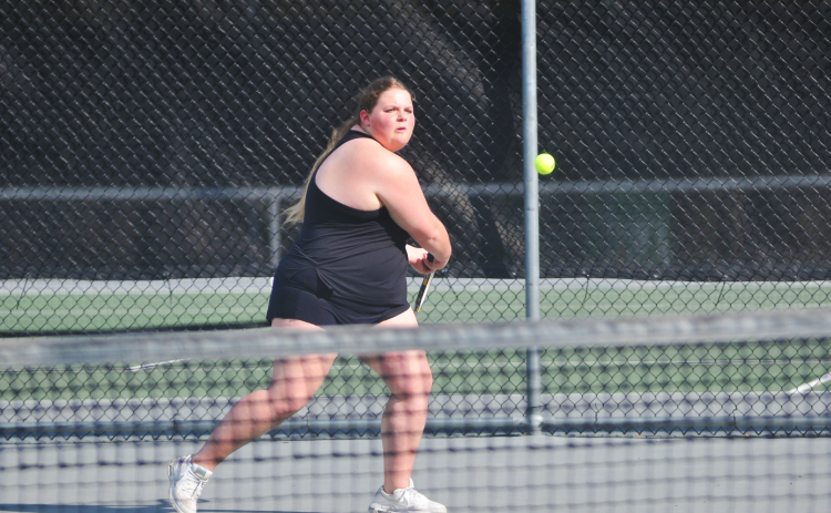 Senior Abigail Martin prepares for the backhand against her Washington Wilkes opponent on April 30.