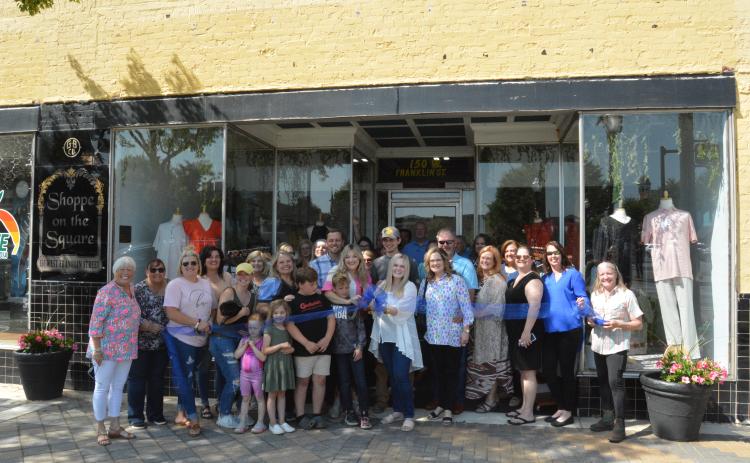 Hart County Chamber of Commerce members and other business leaders meet at BW Threads for its ribbon cutting April 28.