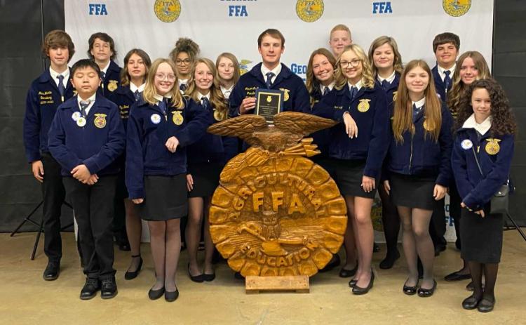 (Pictured, from left to right, are Ashlyn’s father, Brandon Floyd, Ashlyn Floyd, Ashlyn’s mother, Rebecca Floyd, and her brother, Austin Floyd.) Pictured bottom right, Rachel Mize (left), Piper Bond (center) and Ashlyn Stanton (right) all three received their FFA State Degree. This is the highest degree an FFA member can earn while in high school.