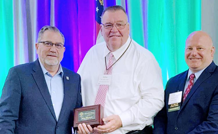 Superintendent Floyd with his award alongside Rob Brown, right, and GSSA Executive Director, left.