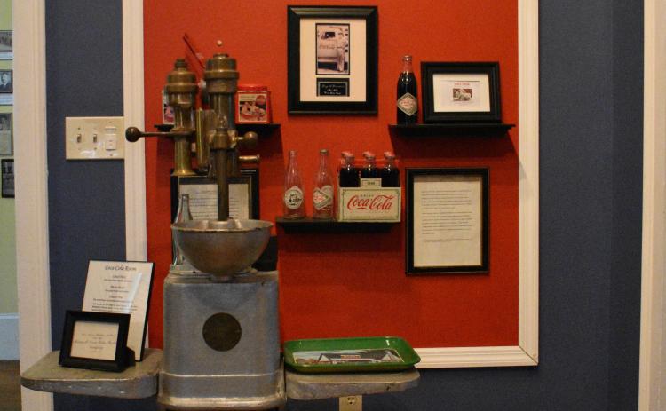 Coca Cola played a big role in Hart County. Coca Cola originally moved into the building that sits at the corner of W. Franklin Street and N. Forest Avenue in Hartwell. Pictured above in the museum, an homage to the cola’s Hartwell history.