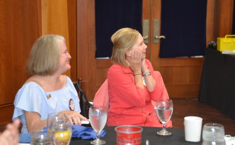 Dan Hunt/The Hartwell Sun DruAnn Williams, right, is shocked upon hearing the news that she was selected for the prestigious Four-Way Test Award. Williams, right, is pictured above at the May 26 Rotary meeting alongside best friend Debbie Kulcsar.