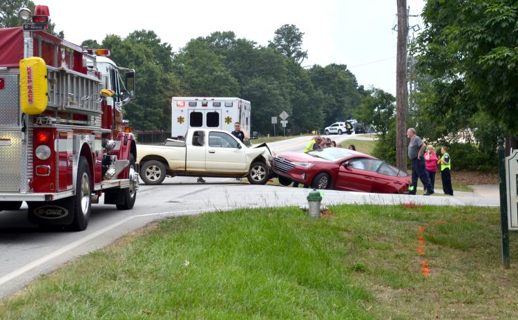 A Monday collision at the corner of S. Jackson and W. Gibson Streets, pictured above, resulted in no serious injuries according to officials.