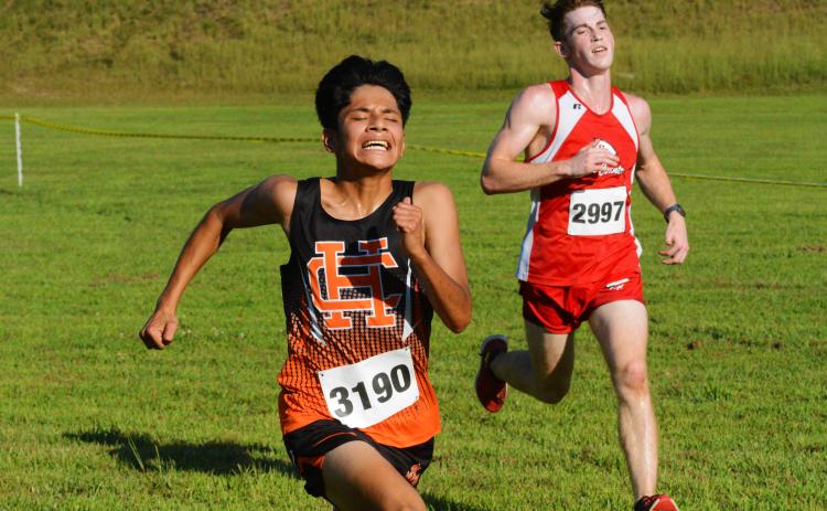 Luis Genchi pushes at the finish line to secure a silver medal in Toccoa.