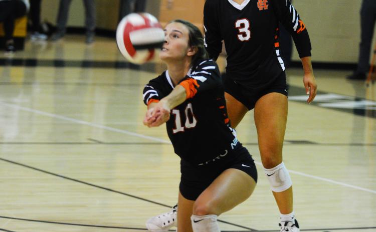 Ryleigh Jordan gets a dig in the match against Wesleyan on Oct. 18.