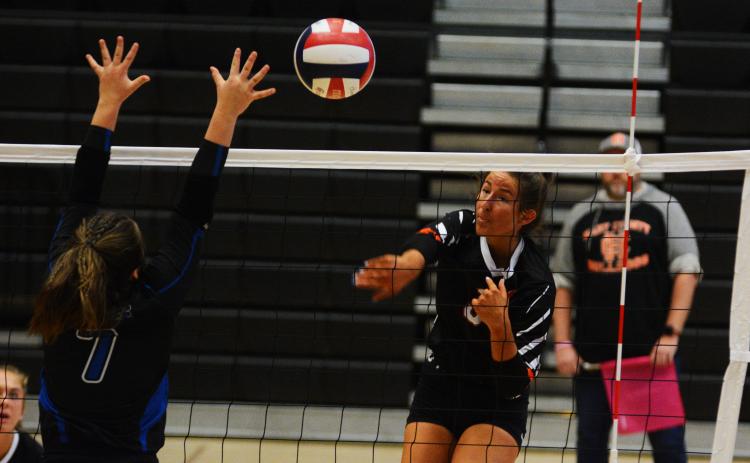 Lillie Rogers goes for the kill in the loss to Oconee County on Oct. 4.