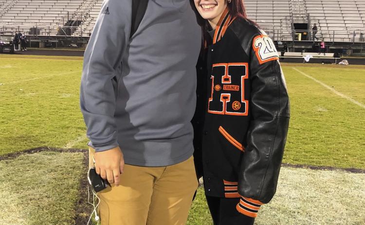 My wife Madison and I after the 2019 home game against Monroe Area.
