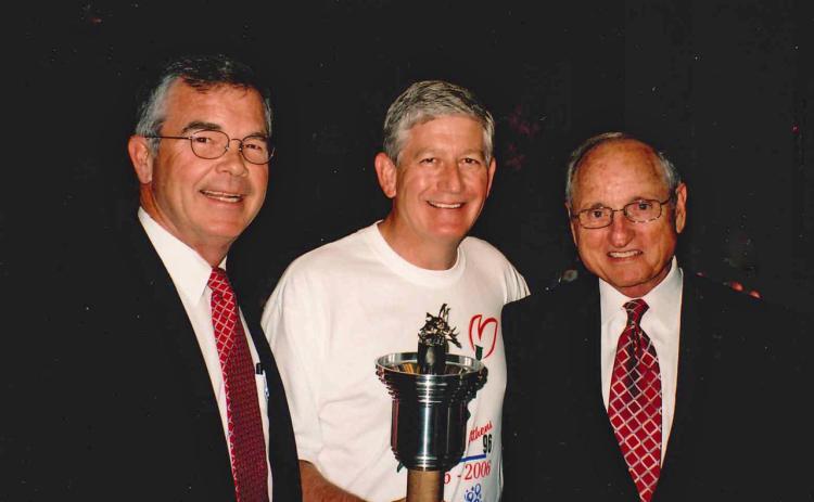 To celebrate the 10th anniversary of the 1996 Olympics, Athens and the University of Georgia re-enacted the torch run. As chairman of Athens 96, I invited Billy Payne, left, and Vince Dooley, right, to speak at the ceremony.