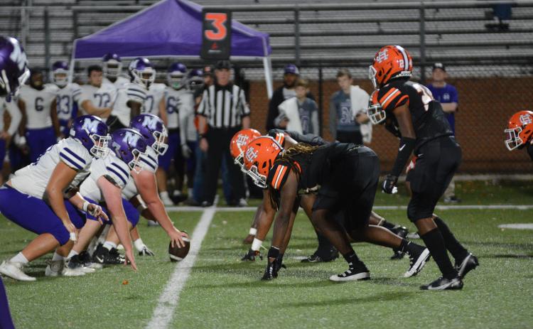 The Purple Hurricanes line up offensively against Hart County's defense in a drive.