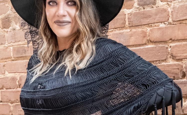 Natalie Floyd gets witchy in downtown Hartwell on Halloween night.
