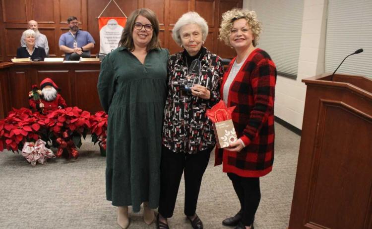 Pictured, from left to right, are Hart County Board of Education Chair Kim Pierce, award recipient Nancy Clark, and Superintendent Jennifer Carter.
