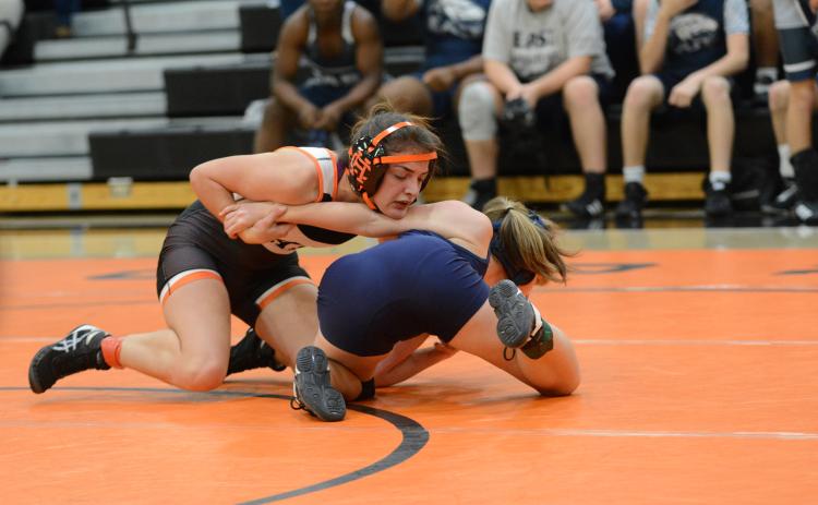 Nicole Whaley pins a Lady Mat Eagle in the home loss to the Mat Eagles of East Jackson, 57-22. Hart also lost to the Mat Tigers of Crescent High School of South Carolina, 45-22.