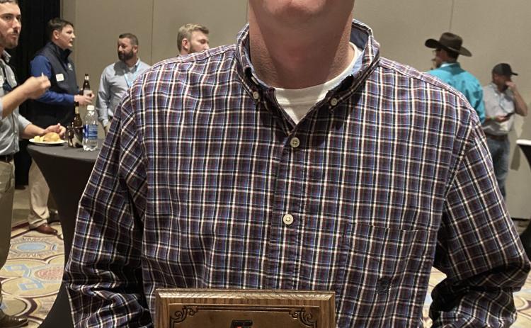 Brian Fleming, left, won the 2022 Georgia Farm Bureau Young Farmers & Ranchers Excellence in Agriculture Award.