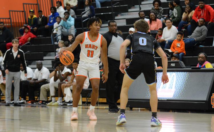Jashon Gaines stares down an opponent before making a play at the rim.