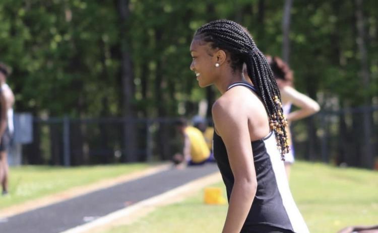 Senior Valasha Carter at a track meet in 2021 at HCHS.
