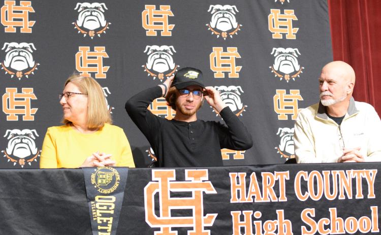 Pictured left to right: Leard’s mother, Karen, senior tennis player Daniel, and his father, Tim, as Daniel commits to Oglethorpe on National Signing Day.