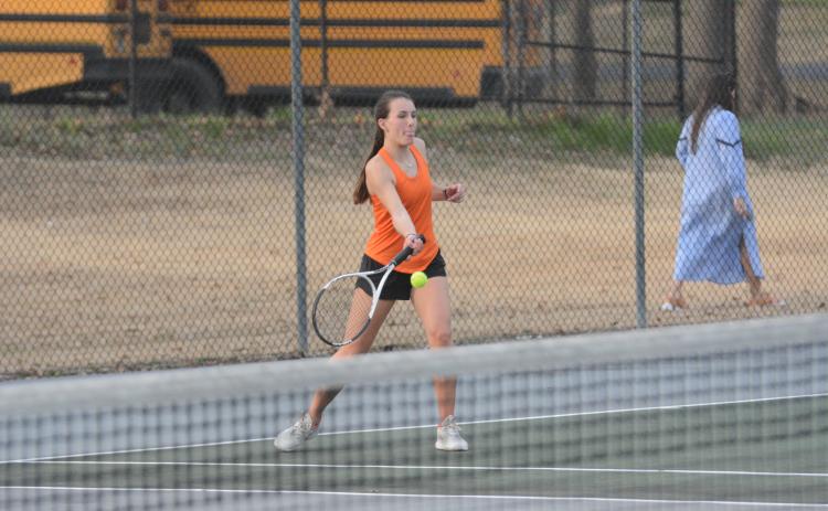 Ryleigh Jordan returns a serve in a heartbreaking loss in a tiebreaker, 3-7 against Elbert.