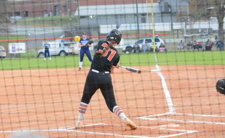 Sophomore outfielder Emma Faust collects a single in game one of the double header versus Johnson of Gainesville as the Lady Dogs get the 20-0, 19-2 sweep over the Knights.