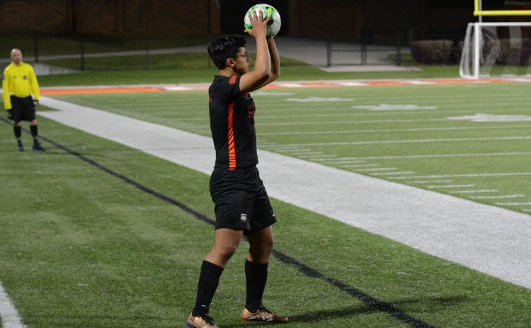 Pictured is junior defender Fabian Rodriguez Escobedo looking down the line on a throw in.