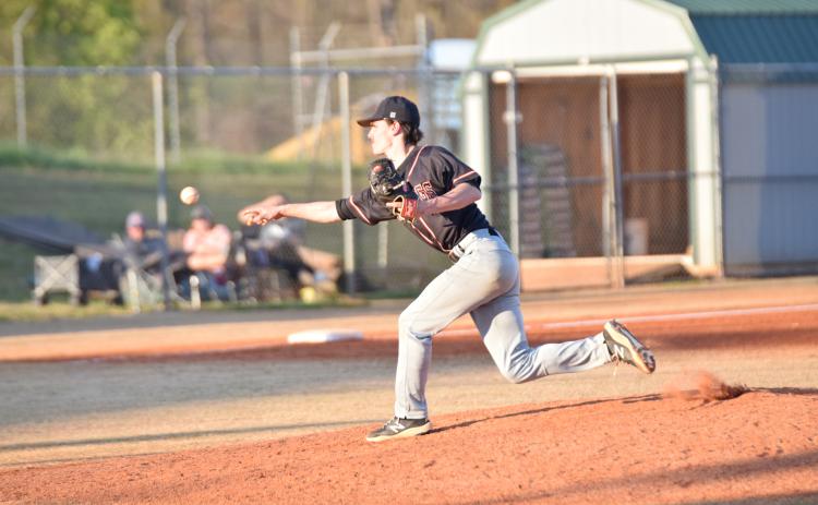 Senior relief pitcher Jordan Leach delivers a fastball in the 16-8 loss in game one of the double header at Franklin on March 23. The Diamond Dogs also lost game two of the double header by a score of 13-10 and were swept by the Lions.