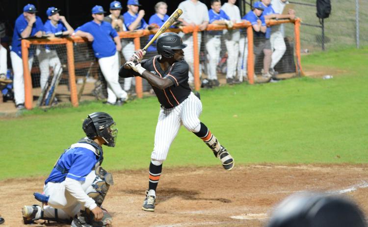 Senior outfielder Paul Davis collects a hit in the sixth inning three run rally but falls to Banks County, 6-4 on Tuesday.