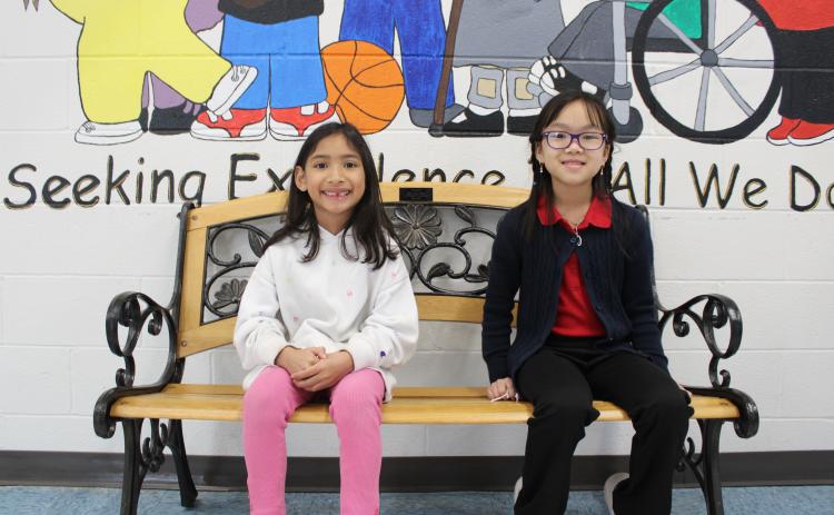 The system-wide Young Georgia Authors contest winners from South Hart Elementary School. Cecilia Le, on left, won the contest for second grade, and Thien My Luong, on right, won the contest for third grade.