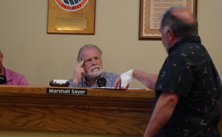 Hart County Board of Commissioners Chairman Marshall Sayer listens to the complaints of Lavonia resident Doug Carter regarding concerns at Paynes Creek Campground during Tuesday’s Regular Meeting.