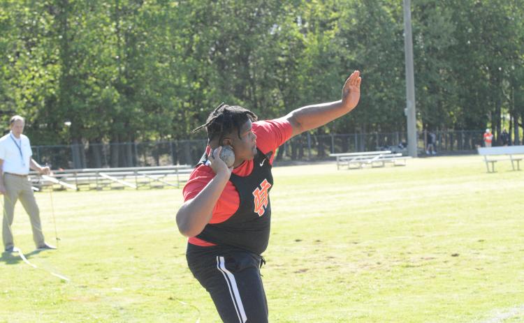 Pictured is senior Derrick Clarke as he placed first in the boys shot put and third in the boys discus.