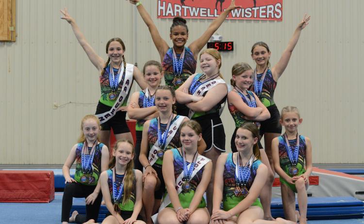 Pictured is the Hartwell Twister gymnastics team after competing in regionals in Pigeon Forge, Tennessee on May 13-14. First row from left to right is the bronze level: Kennedi Pennington, Charley Lloyd, and Adrianne Pennington. Second row from left to right is the silver: Tristyn Thompson, Julianne Bond, and Emma Kale Garland. Third row from left to right is the level four: Aeryn Back, Chastyn Haynie, and Gracen McAdams. Fourth row from left to right is the diamond: Madalyn Dault, Cheyenne Rucker, and Maci