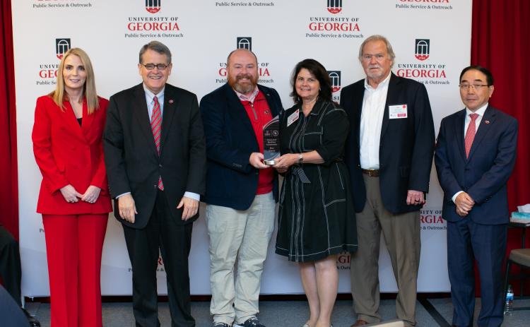 Hart Archway executive committee members Bill Leard and Jason Ford accepted the platinum designation for Hart County becoming a Connected Resilient Community during UGA’s awards week. Pictured from left to right are Jennifer Frum, UGA Vice President for Public Service and Outreach; Jere Morehead, UGA President; Jason Ford, Hartwell Economic and Community Development Director; Michelle Elliott, Archway Partnership Director; Bill Leard, Hart County Archway Partnership Executive Committee Chairman; S. Jack Hu,