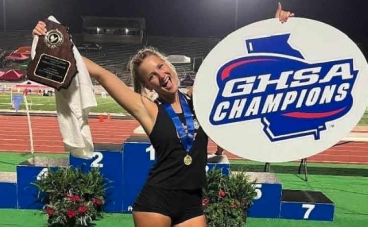 Junior pole vaulter Amelia Johnson celebrates after winning back-to-back state championships at the GHSA 3A State meet on May 11-13 in Albany.
