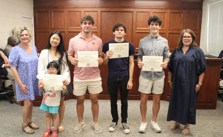 The top honor graduates for the Hart County High School Class of 2023 were recognized and honored during the Hart County Board of Education meeting. Pictured are (L-R) Superintendent Jennifer Carter, Co-Valedictorian Huong Pham, Co-Valedictorian Riley Posey, Salutatorian Thomas Floyd, Third Honor Graduate Tate Phillips, and Board of Education Chair Kim Pierce.