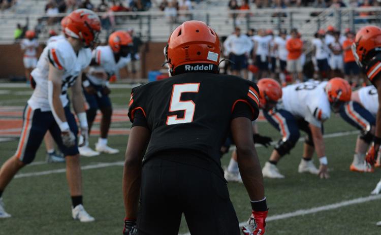 Rising senior quarterback and cornerback Jashon Gaines gets set to cover a receiver in the 2023 spring game on Friday, May 19 against Habersham Central.