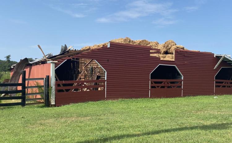 A straight-line wind event did severe damage on Saturday evening along Highway 77. The storm ripped the roof off of the Hicks family barn and destroyed a large number of trees.