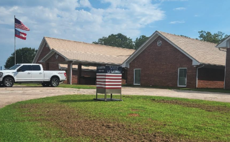 The new temporary home for the American flag drop box is at the 911 Center on Chandler Street. The box was moved due to the construction on the new firehouse and this location has very easy access for drop off. The American Legion will recover and give a proper disposal of American flags.