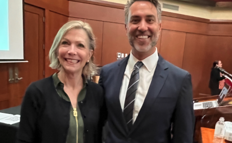 Harmony House CEO Laurie Whitworth (left) and child abuse pediatrician Dr. Stephen Messer of Childrens Health Care of Atlanta during the Northeast Georgia Sexual Assault Summit.