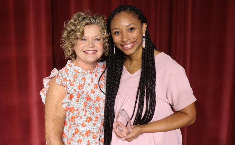 Britney Morrison, the 2023-2024 Hart County Charter System Teacher of the Year, pictured right, poses for a photo at Convocation alongside Superintendent Jennifer Carter.