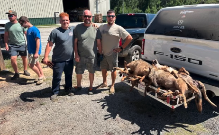 The Lights Out Predator Removal team, consisting of  (L-R) Mason Gomez, Travis Ballard and Bryan Gagnan finished in first place in The Dog Hoggers Annual Hunt for killing the three heaviest coyotes.  The event benefitted Toys for Tots and the Wounded Warrior Project.