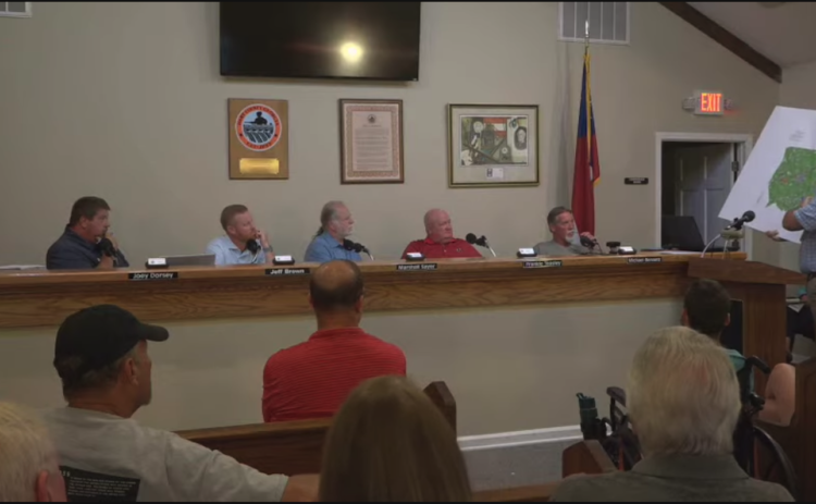 Surveyor Aaron Blomberg discusses zoning ordinances at the Hart County BOC meeting