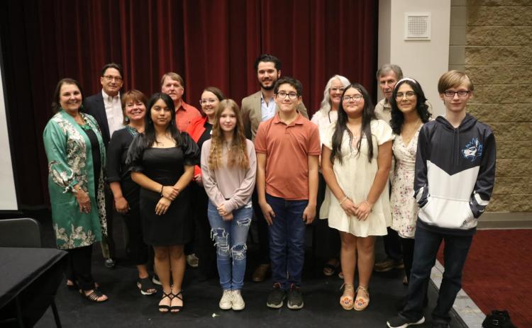 Pictured are the 2023 REACH Hart scholars alongside the program’s community sponsors who were recognized at the signing ceremony. Pictured, from left to right, are OneHartBeat Foundation Director Bobbie Busha, Kennon Keiser, Becky Loggins, Geraldine Vera Saldana, Rotary Club of Hartwell representative Jeff Loggins, South State Bank representative Kayla Poole, Deborah Ingram, Oglethorpe Power representative Davis Warnell, Jorge Aguilar, Hart Telephone Company representative Wyndee McKinnon, Adriana Perez-Lop