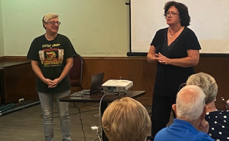 HCCT’s Lani Sessions (left ) and Sarah Martell address retired educators