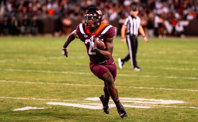 Former Hart County and current sophomore running back for Virginia Tech Malachi Thomas runs the football against Syracuse earlier this season on Oct. 26 in the 38-10 home win.