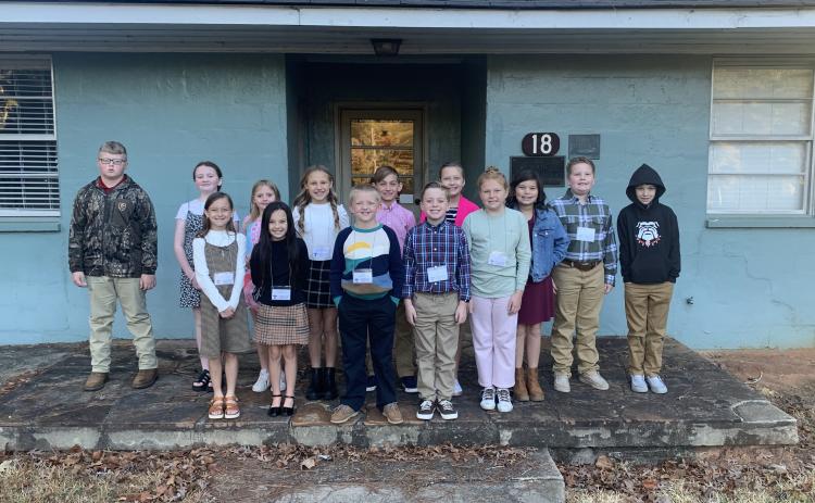 North Hart students from left to right: front row: Ivy Tatum, Whitley Bridges, Jackson Green, Harrison Carter, Tessa Lorentson;  back row: Haygan Royston, Rhiley Atkinson, Gabby Brown, Sadie Martin, Corben Weir, Anna Maxwell, Madeline Busbee, Josiah Andrew, and Jackson Little
