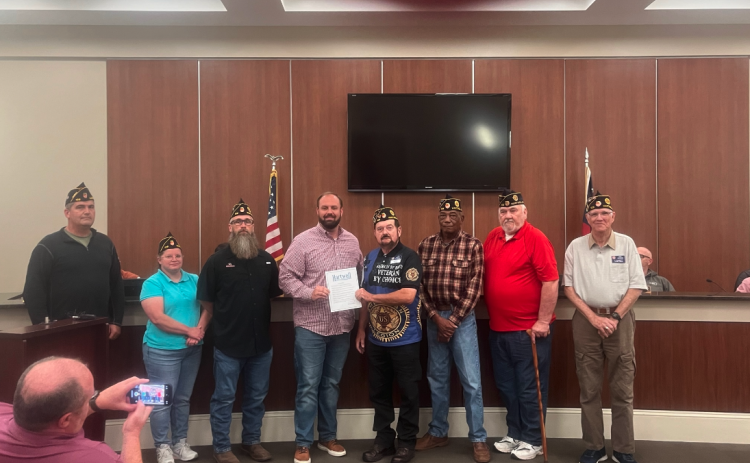 Commander James Fulghum and the men and women from American Legion Post 109 accept a Veteran’s Day proclamation from Hartwell mayor Brandon Johnson.