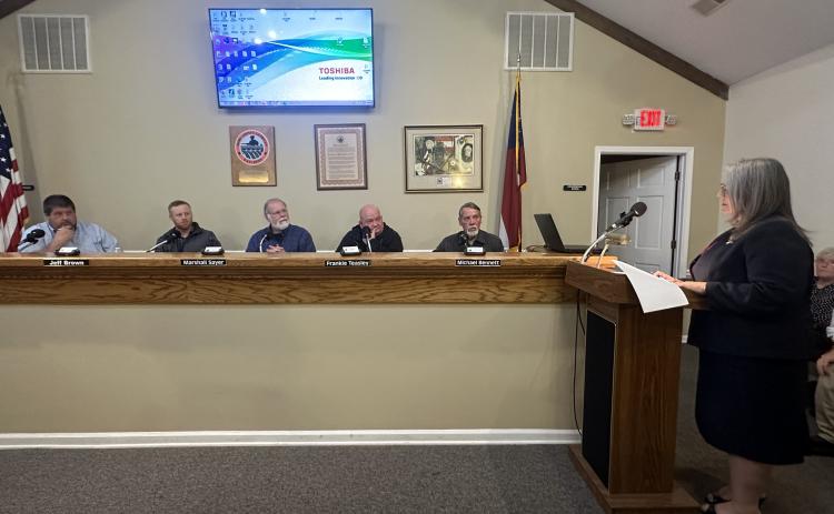 County attorney Kim Higginbotham speaking to the BOC at their Feb. 13 meeting.