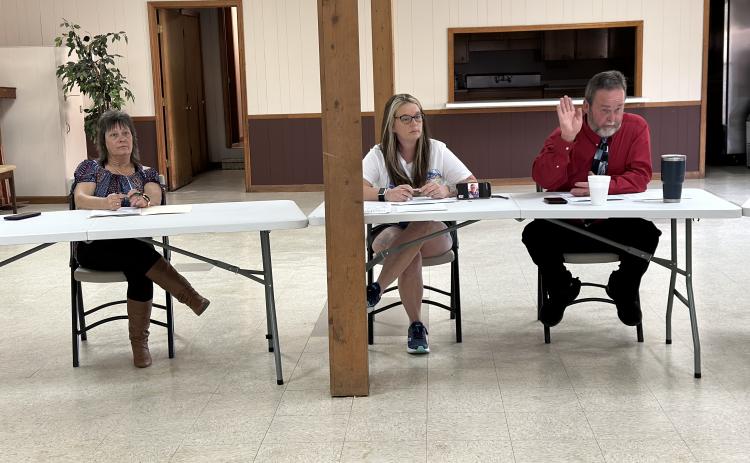 Bowersville leadership hears residents voice their opinions about the historic Cheek building. From left to right: Joyce Rumsey, Alicia Barnett, and Mayor John Smith.