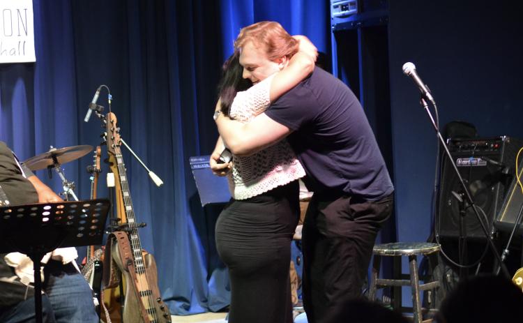 The monthly blues jam at High Cotton Music Hall turned into a magical event. Caden Strother surprised his long-term girlfriend, Stephanie Brena, with a marriage proposal.