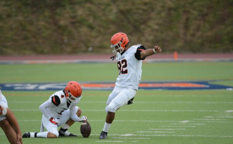 Sophomore kicker Ivan Delgado (92) prepares to kick the point after attempt in the 2024 Spring Game versus Habersham.