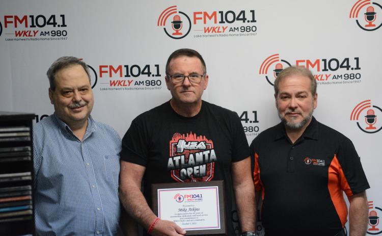Pictured from left is Bryan Hicks, Mike Atkins, and Bruce Hicks during Atkins 40th anniversary at WKLY.